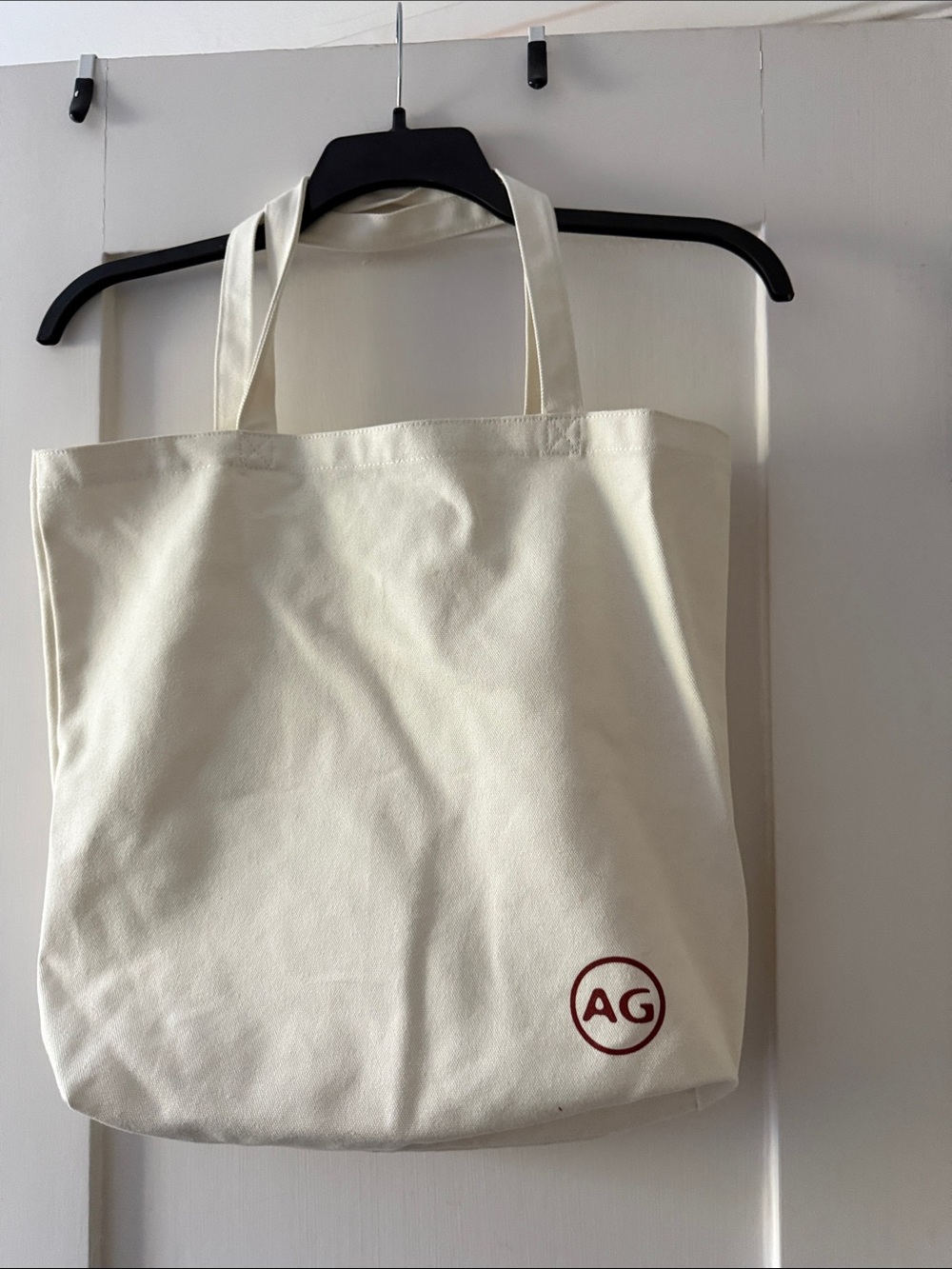Ag Adriano Goldschmied Cream Canvas Tote with Red Logo